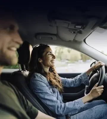 Interior shot of a couple driving